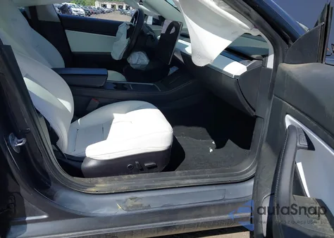 2021 Tesla Model 3 Standard Range Plus Rear-Wheel Drive from USA, damaged, VIN 5YJ3E1EA5MF920820